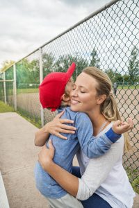 Parents use youth sports to support and teach their kids essential life lessons